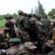combattants rebelles route